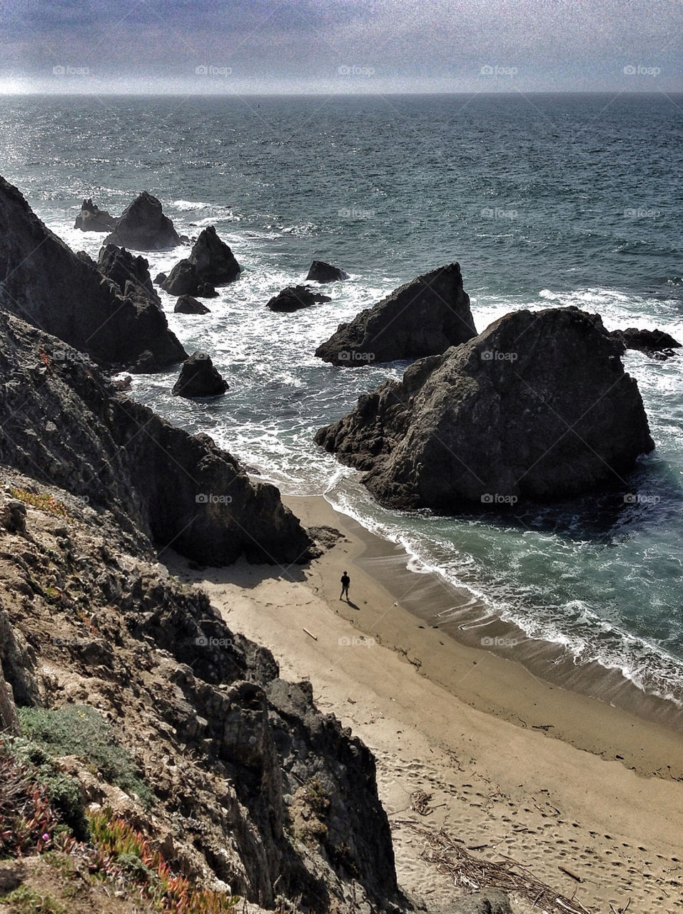 Solitary man on the beach