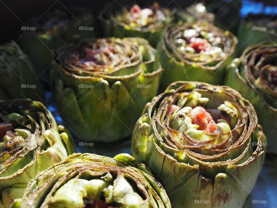 Artichokes with ham ready for the barbecue