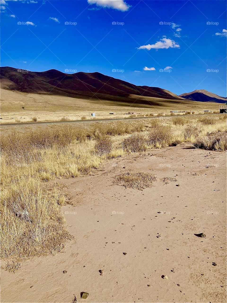 This road leads through the desert near the “Uniyuni Salt Lake”. in “Bolivia” in “Central America”. 2022. Hypnotic Productions