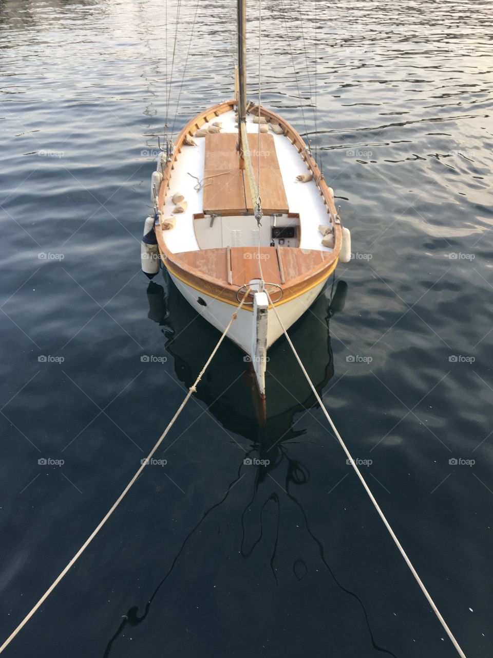 Wooden little boat in harbor 
