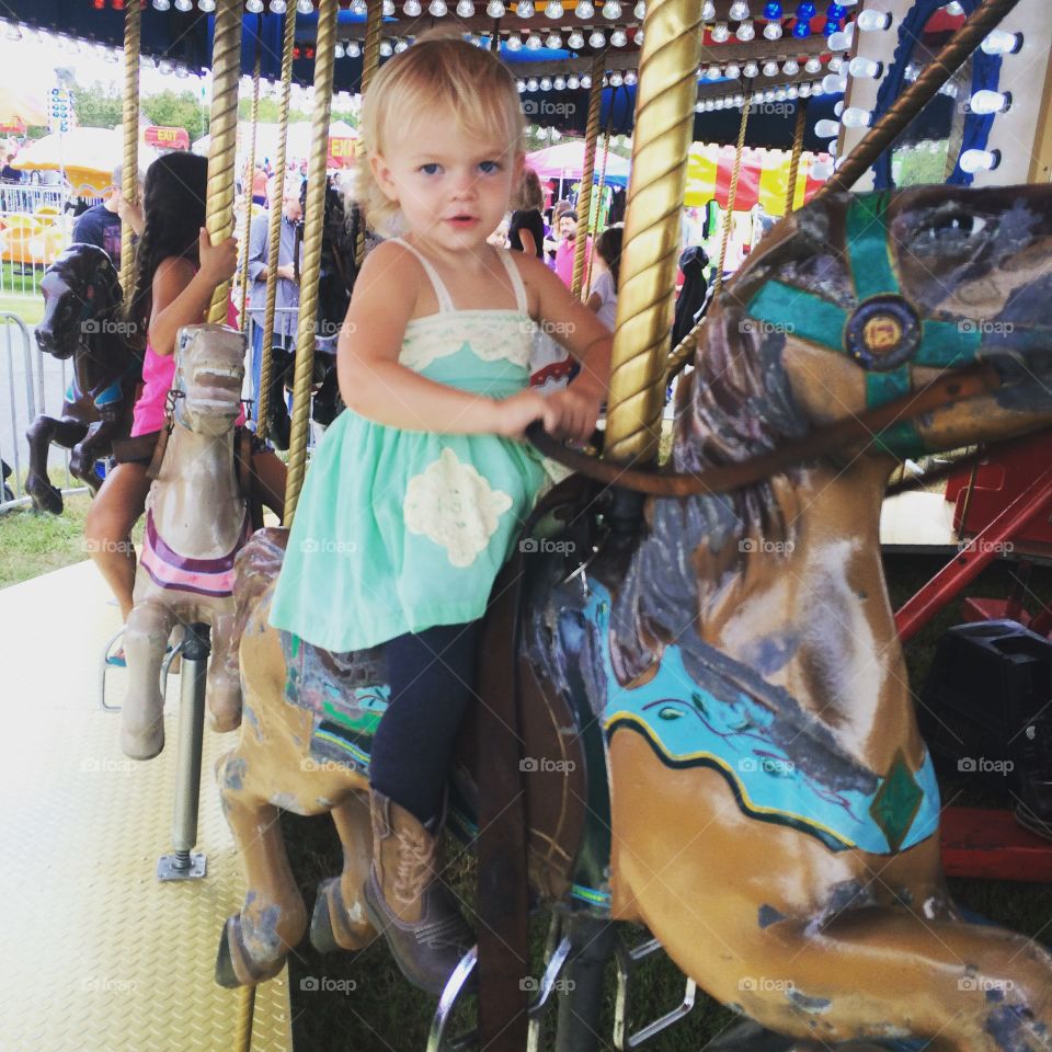 Fall fair carousel ride.