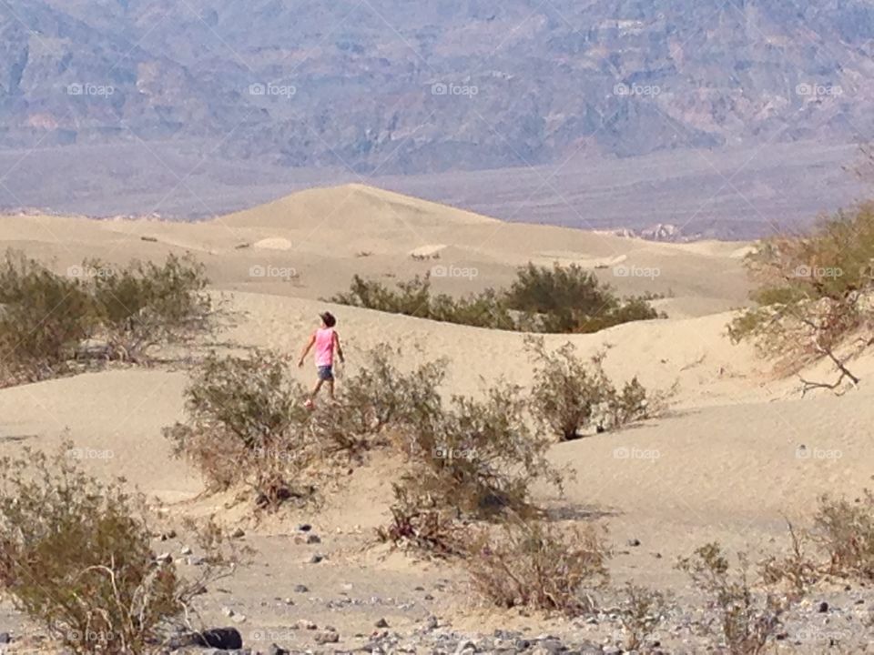 Man in the mosquito dunes located in the death valley,Nevada