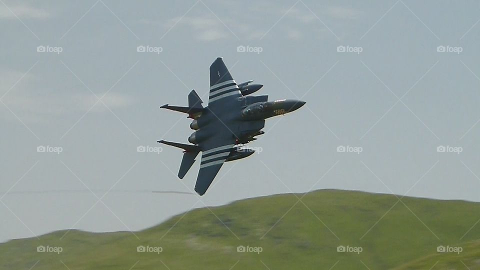 American F15 in D Day markings flying in the Mach loop UK