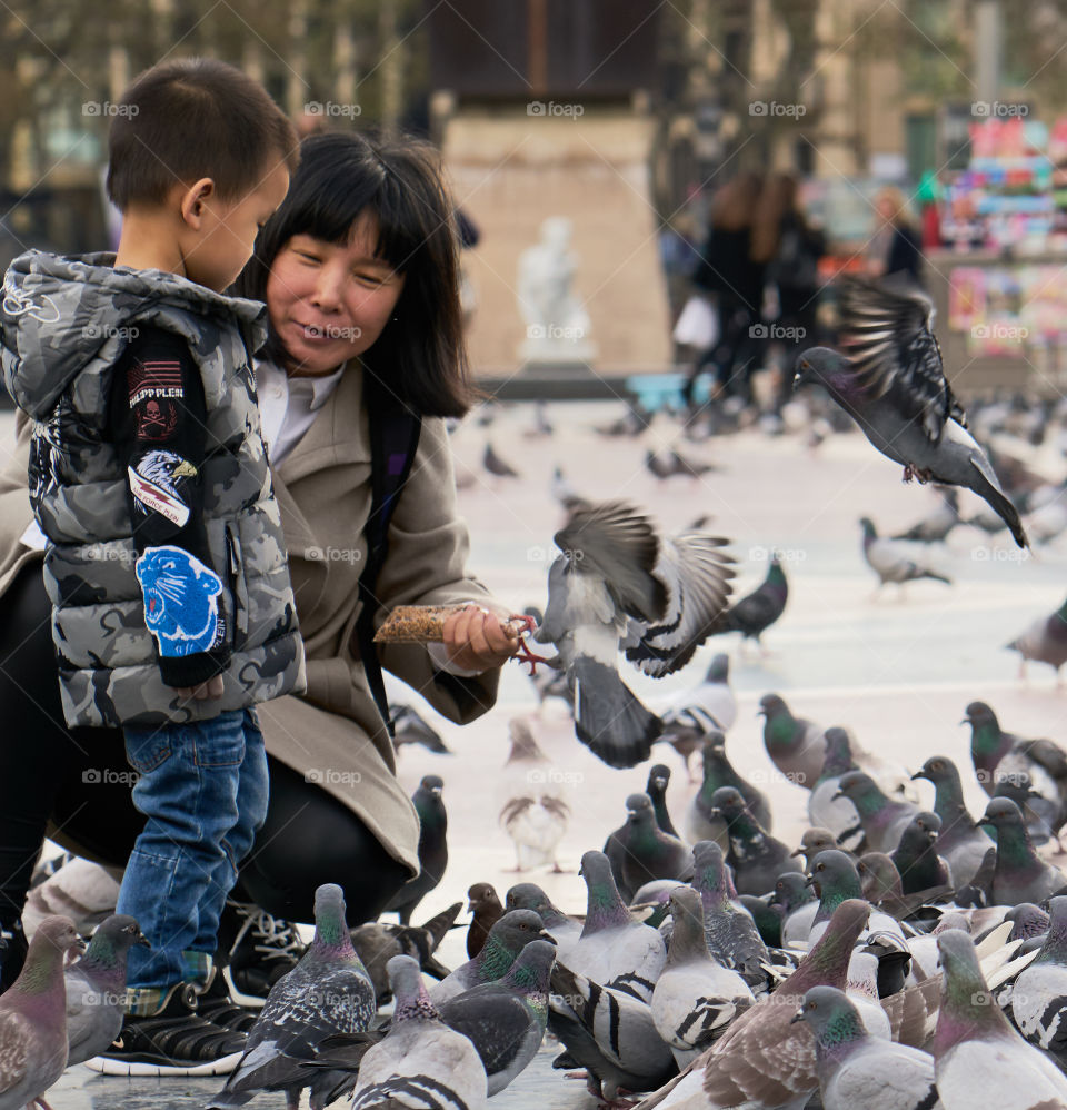 Mother, son and Pigeons 