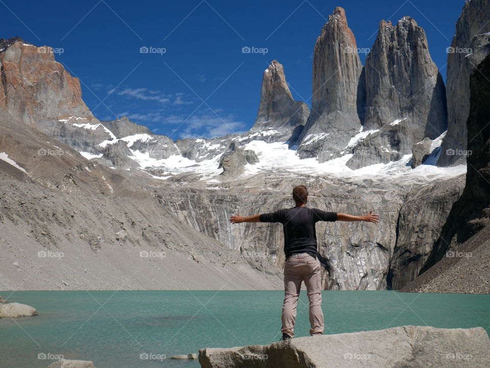 Man enjoying a view over peaks in Torres del Paine, Chile