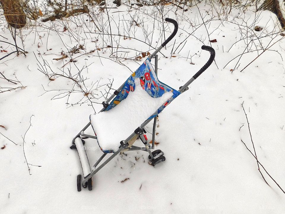 Abandoned infants pushchair...