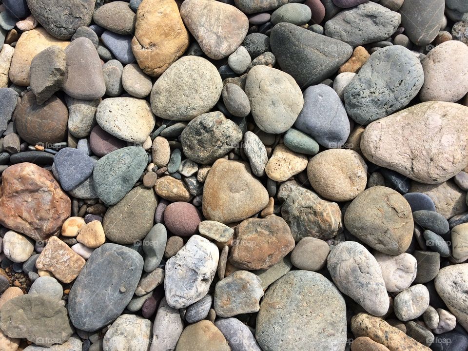 Water-rolled stones at the beach