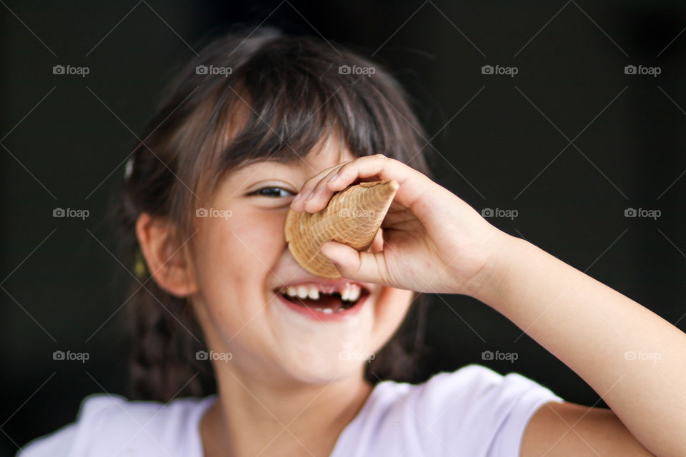 Cute little girl with an ice cream cone