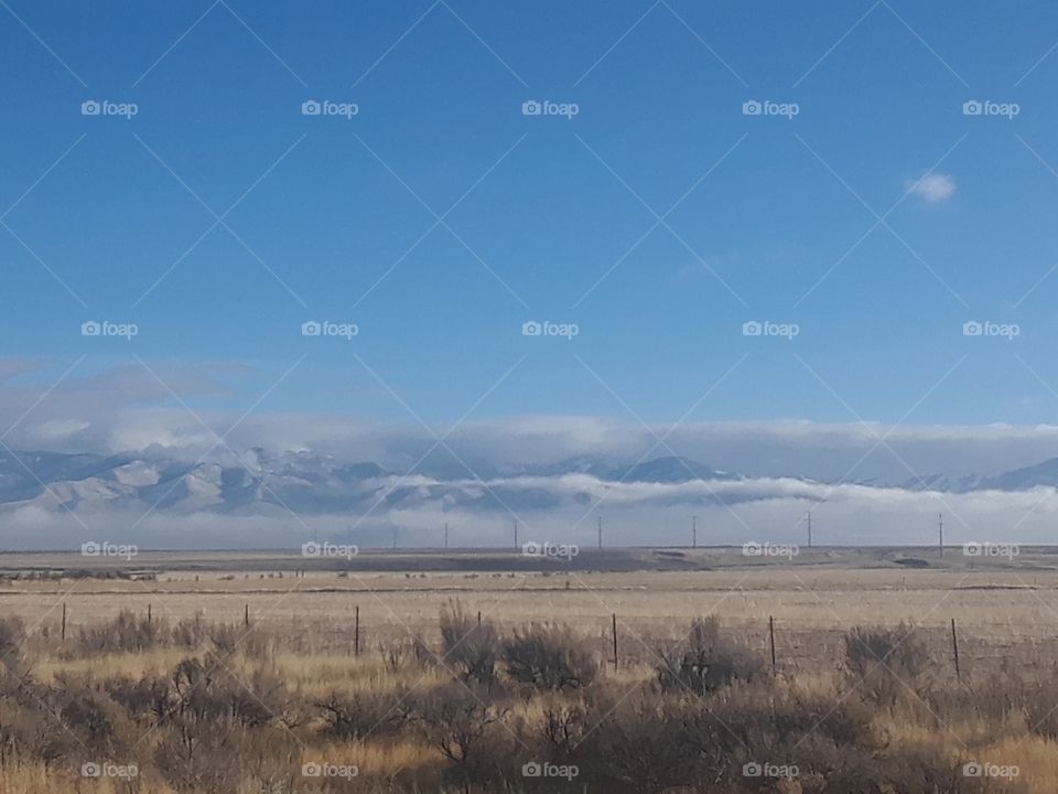clouds and fog cover the mountains in Southeast Idaho