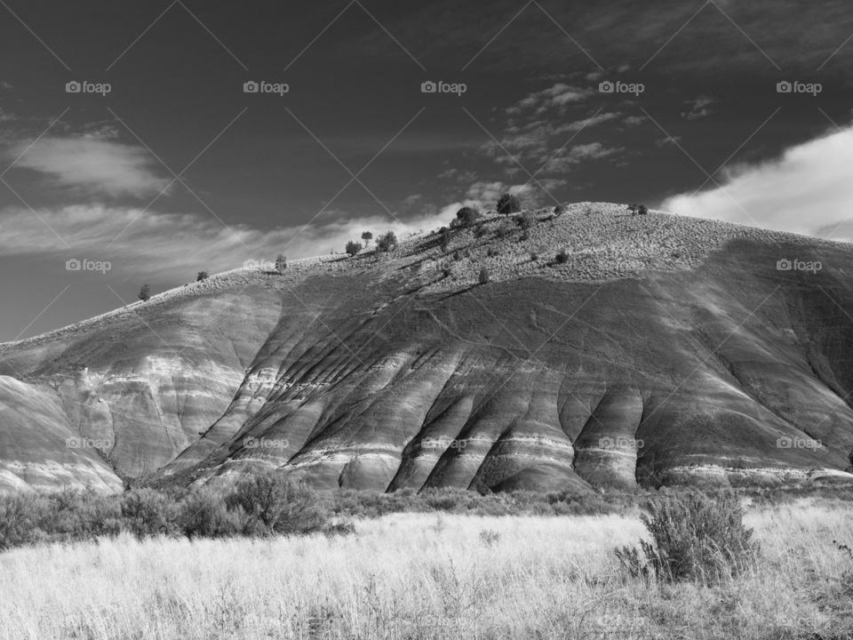 Layers and texture of Eastern Oregon’s Painted Hills on a sunny fall day