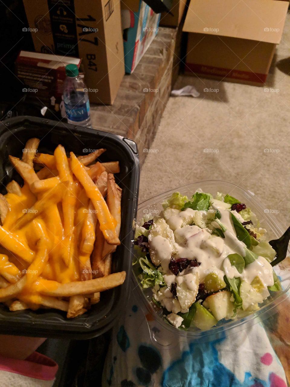 fast food from Wendy's harvest salad with ranch and cheese fries