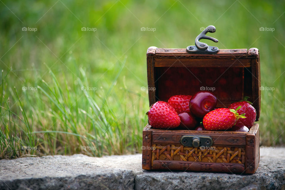 Close-up of fresh cherries and strawberries