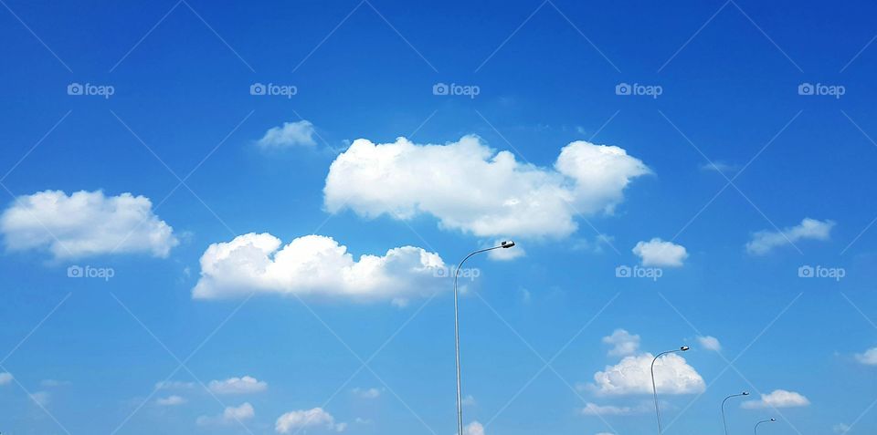 The blue sky with white cloud