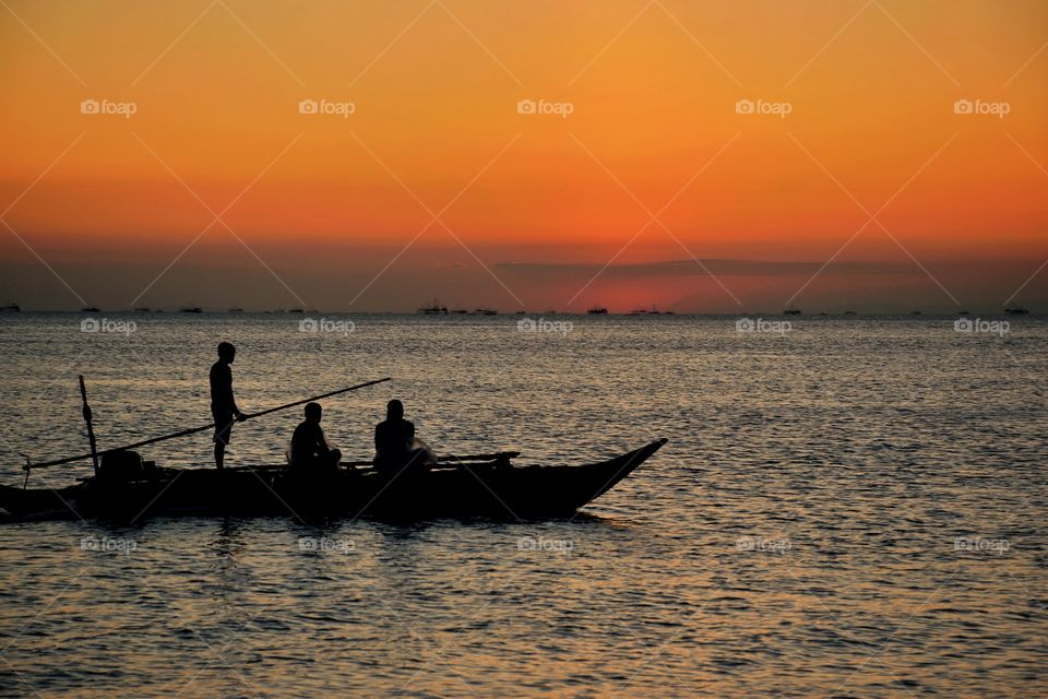 fishing during the sunset