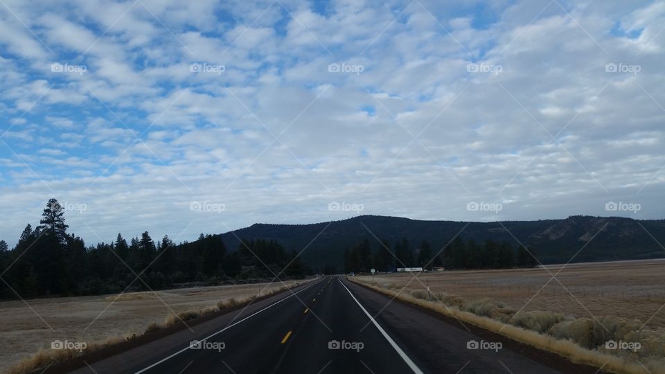 open road with a mountain landscape