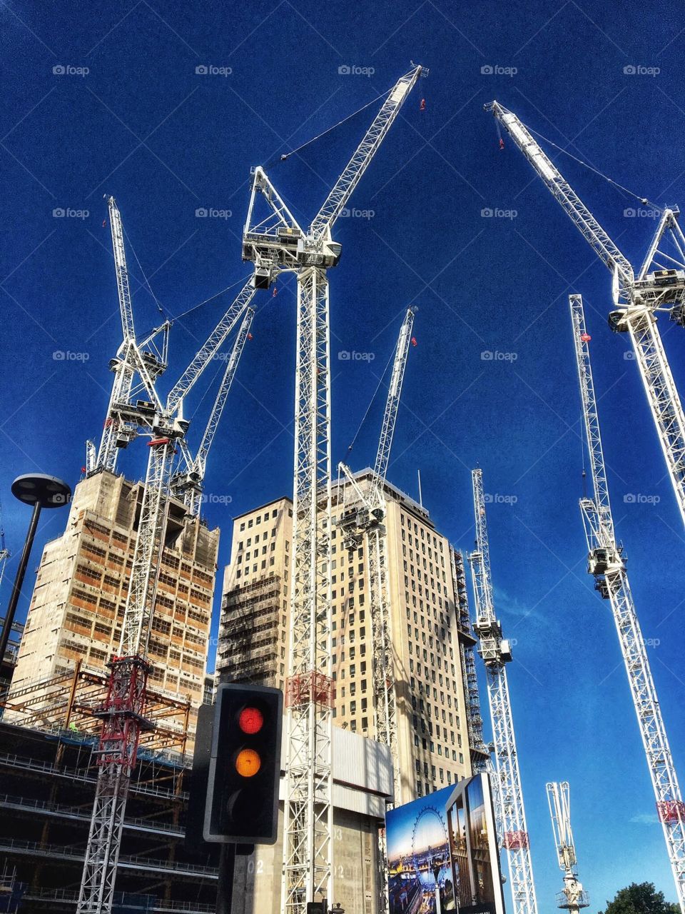 Cranes over North London buildings