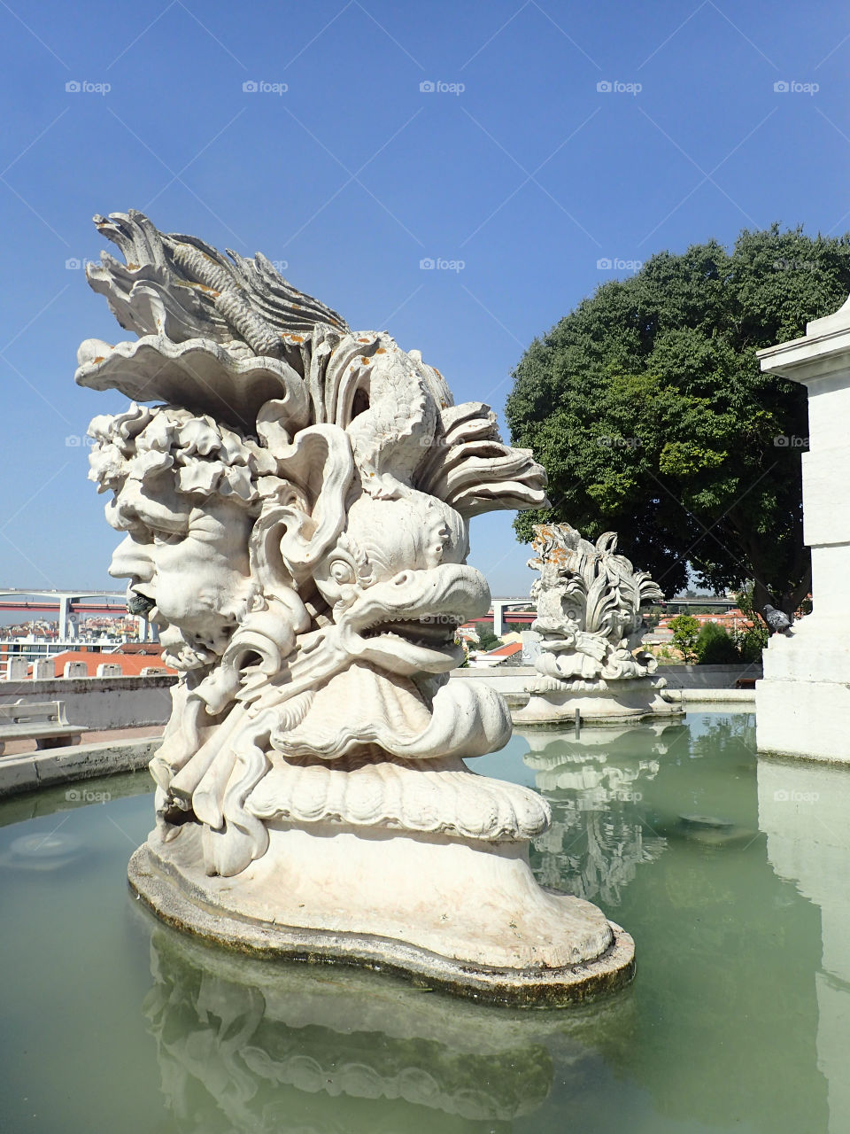 Ancient beautiful fountain in the city center in Lisbon Portugal