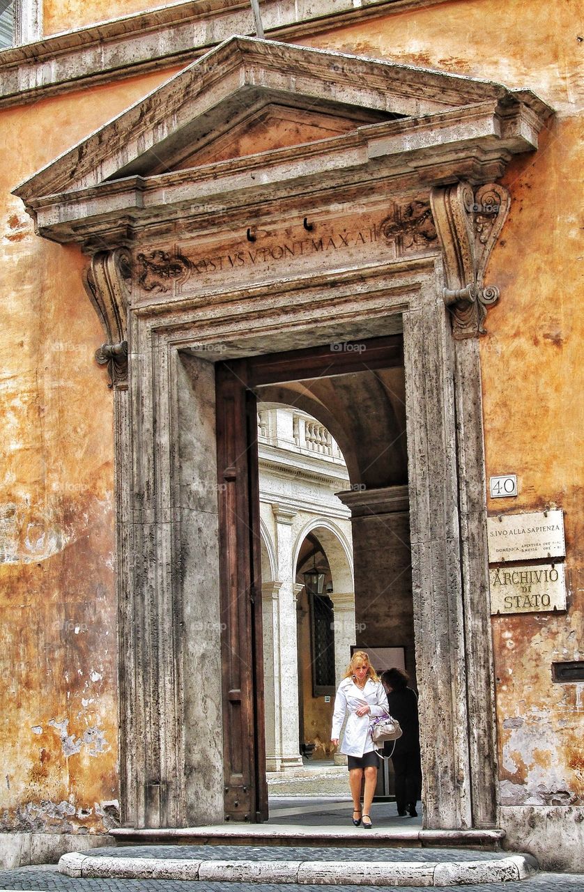 Woman leaving building