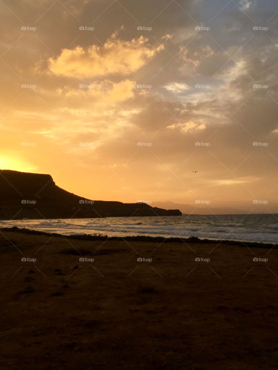 Creatian sunset, sea, sand, beach,plane landing, beautiful sky, clouds, peaceful 