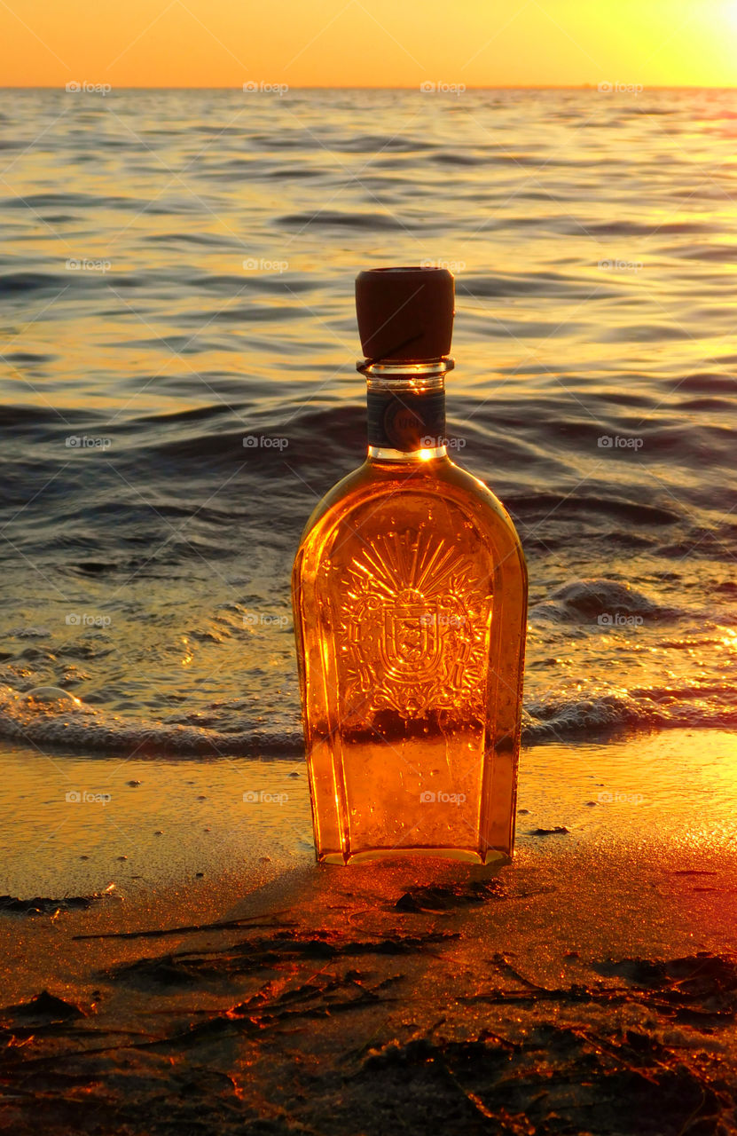 Sunset in a decorative bottle!
The sun was sinking behind the horizon, but left behind a magnificent sunset that cast its shimmering rays across the Choctawhatchee Bay