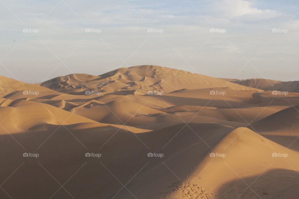 Dessert with shadows from the dunes.