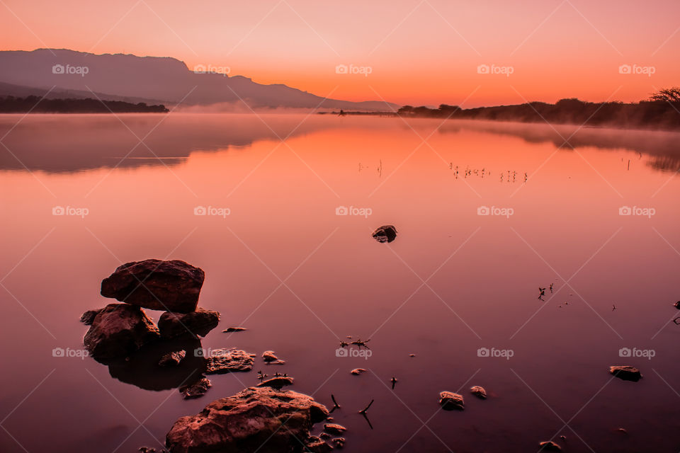 sunrise over a lake