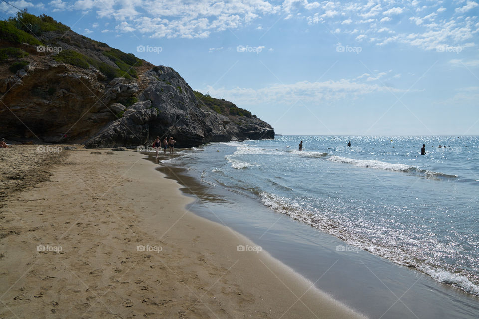 View of people at beach, Barcelona, Spain