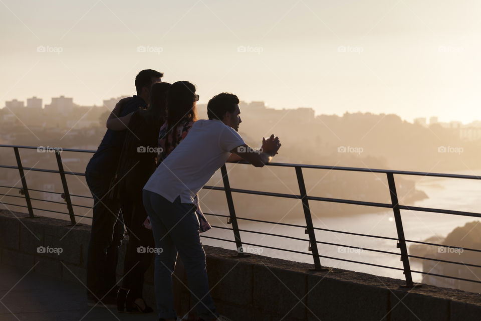 Friends enjoying view and the sunset