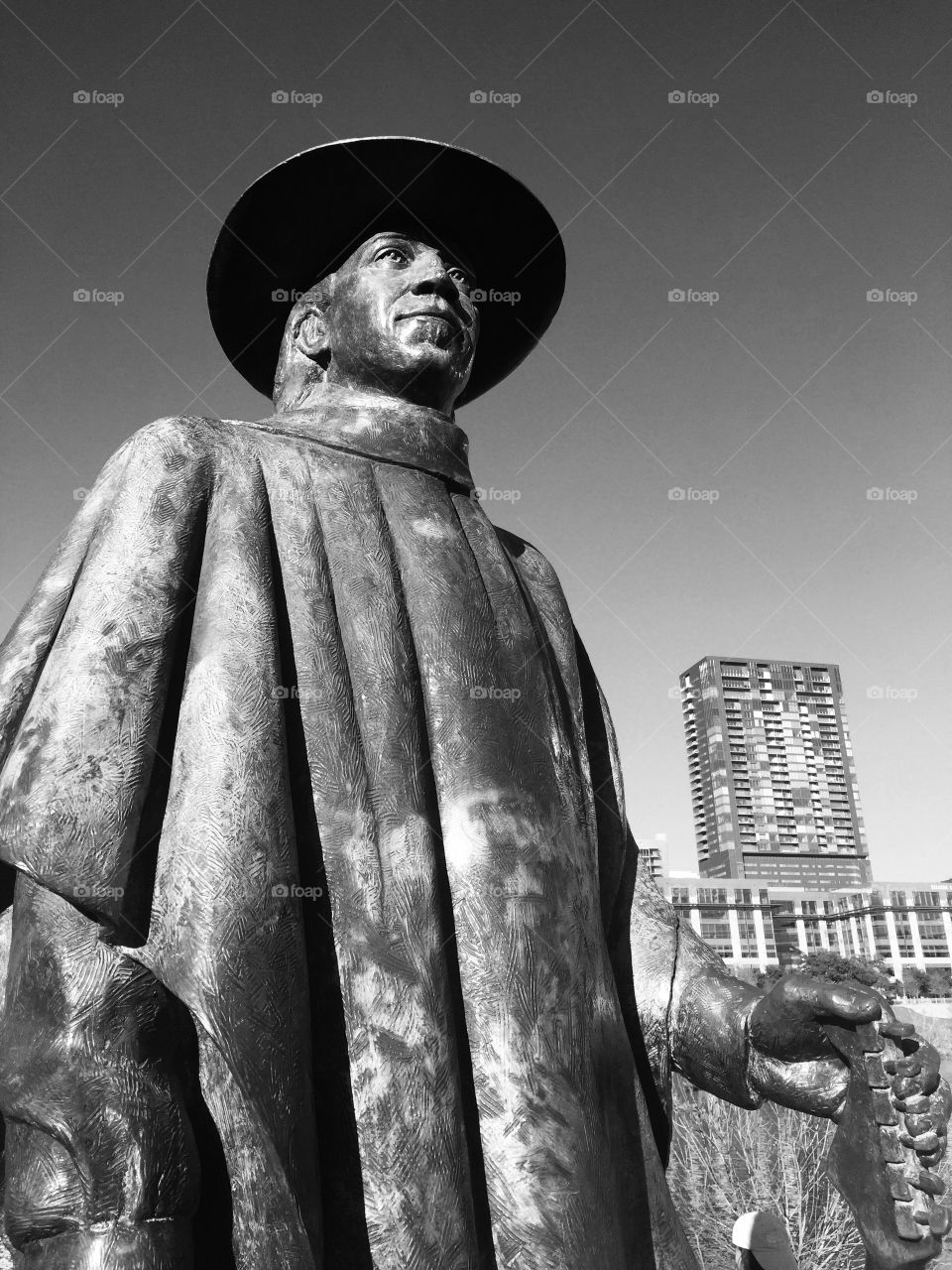 Stevie Ray Von statue with Austin Skyline - Lady Bird Lake