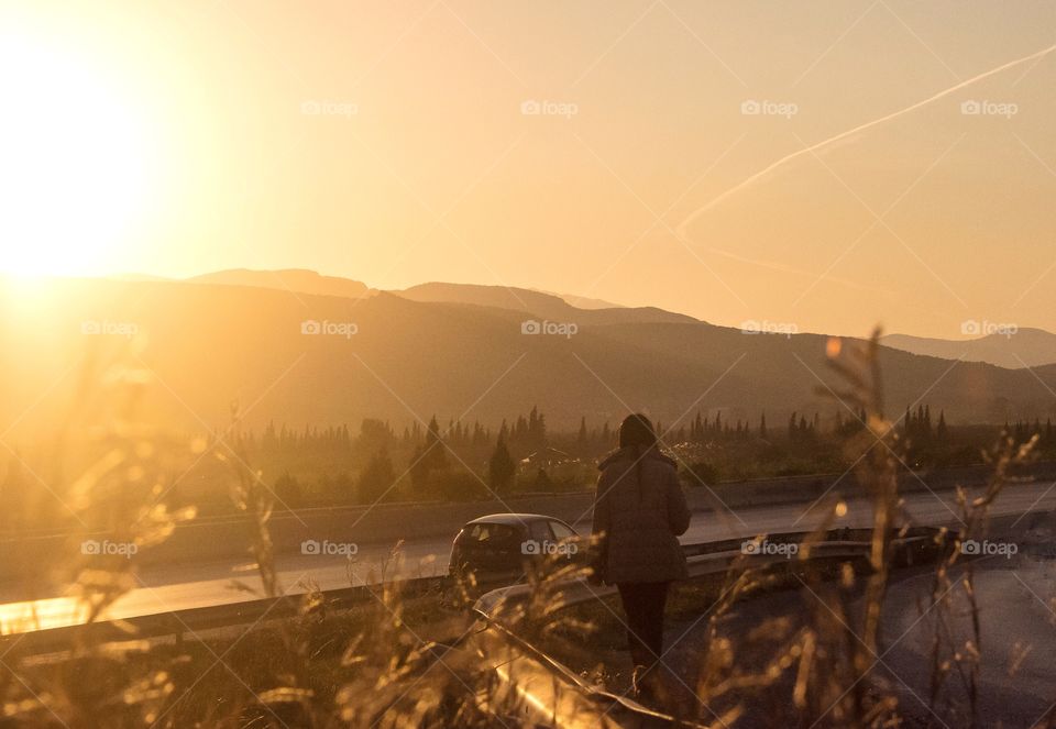 sunset behind mountains 