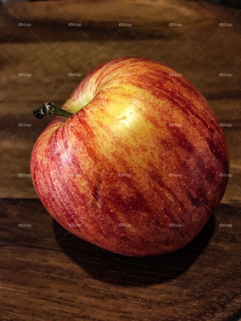 A vibrant looking apple.