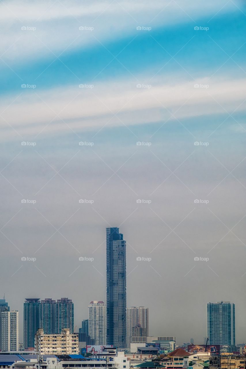 Beautiful skyscraper in front of blue sky background in Bangkok Thailand