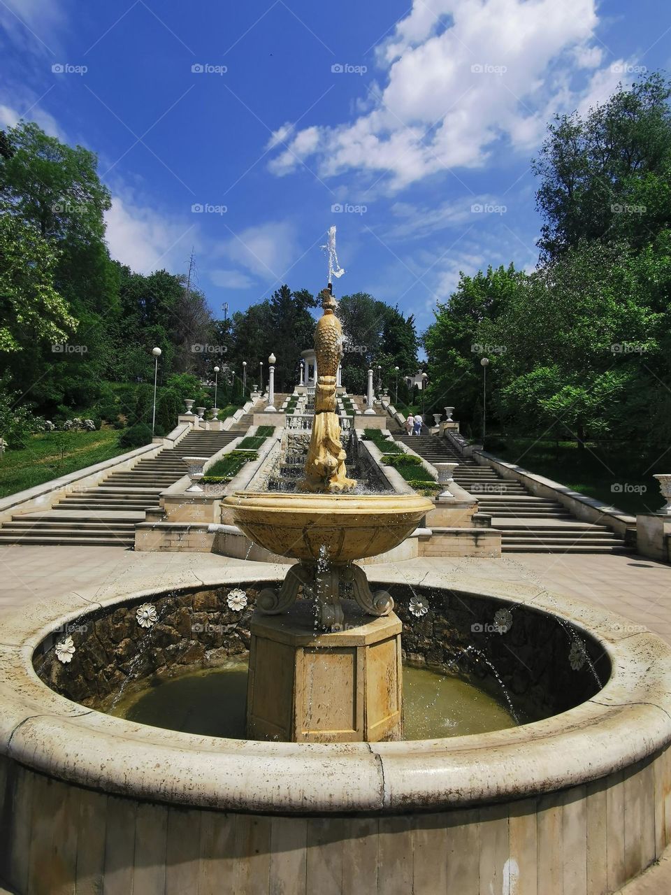 Waterfall and well in the park. Cascading stairs in Chisinau, Moldova