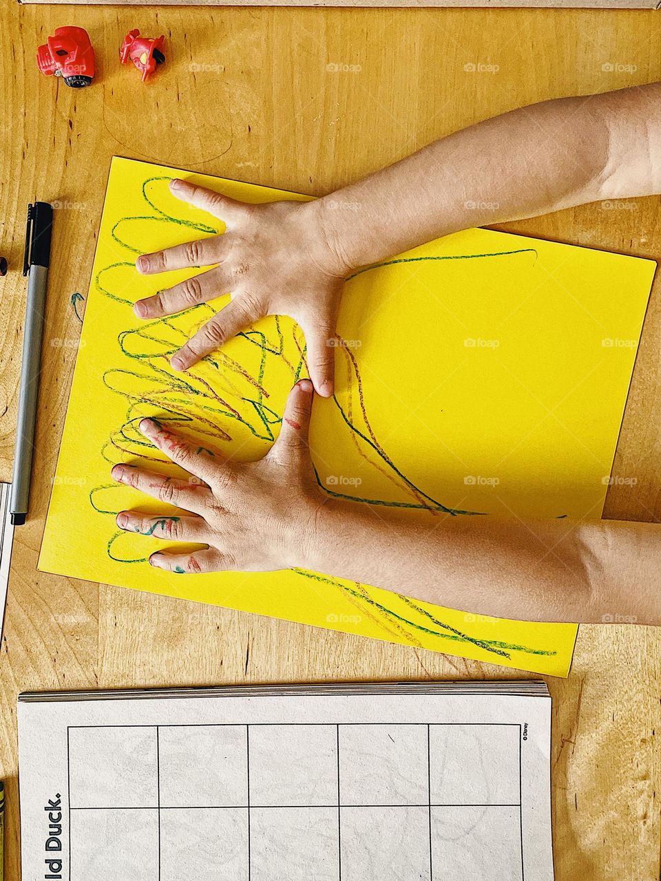 Child tracing hands on paper, toddler making crafts, kids having fun with paper, messy hands for art, making art with toddlers, toddler girl creates art 