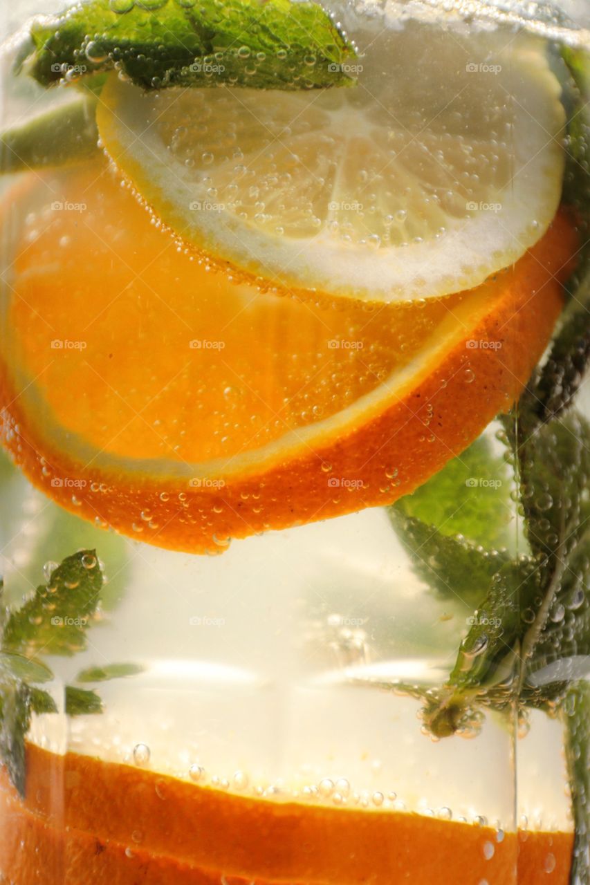 Lemonade with orange lemon and mint 