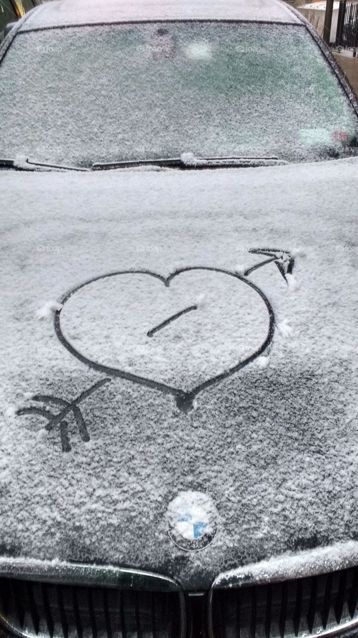 Heart and Arrow Drawn on a Car NYC in the Snow in Winter