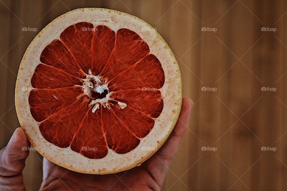 Hand Holding Grapefruit, Grapefruit With Wooden Background, Delicious Fruits, Details Of A Grapefruit, Breakfast Food 