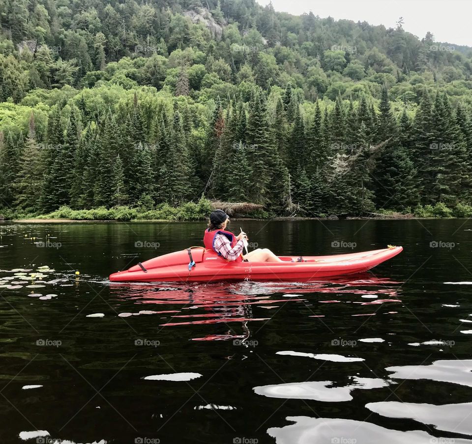 A beautiful day kayaking on Lac Monroe in Mont Tremblant National Park, Quebec, Canada.