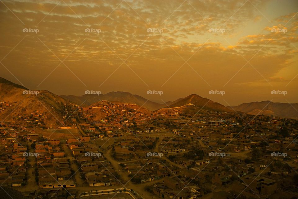 Panoramic view of a multitude of houses at sunset 