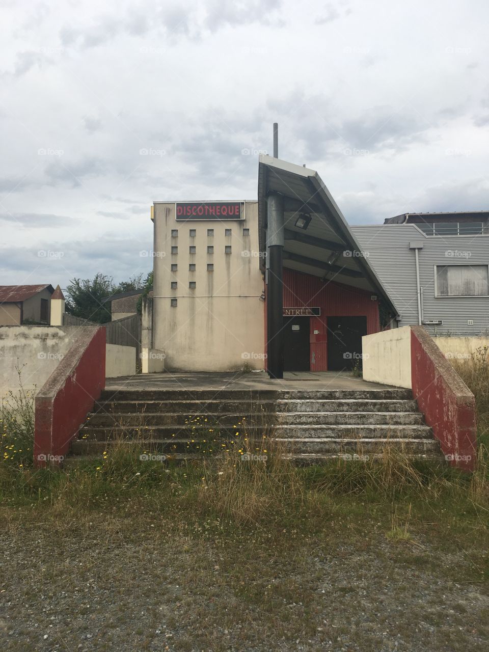 front of a French Discotheque