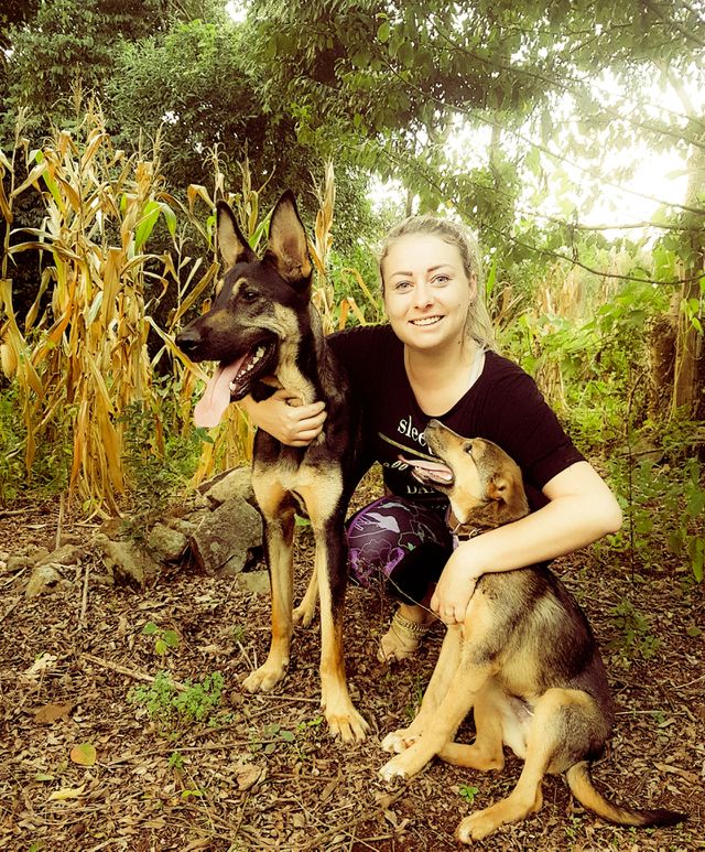 Woman sitting with dog