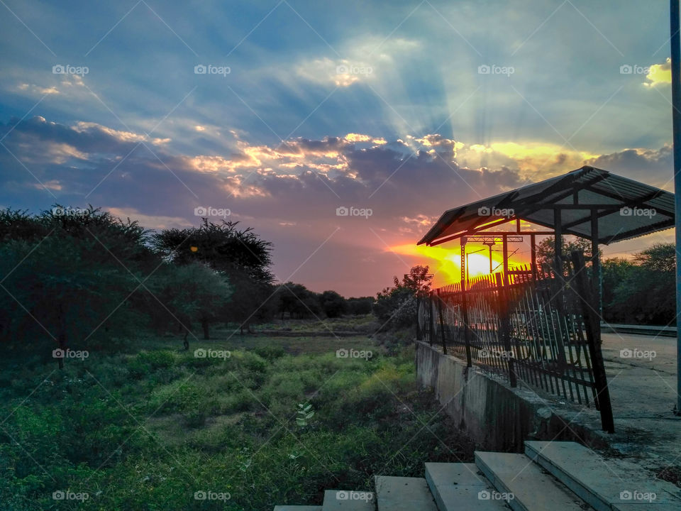 Brilliantly Orange Sunset on the Railway Station | Railroad Sunset | The Golden Hour | Dusky or Foggy Atmosphere | Scarlet clouds | Randomly clicked