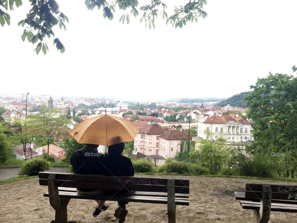 Couple overlooking Prague on a rainy day!