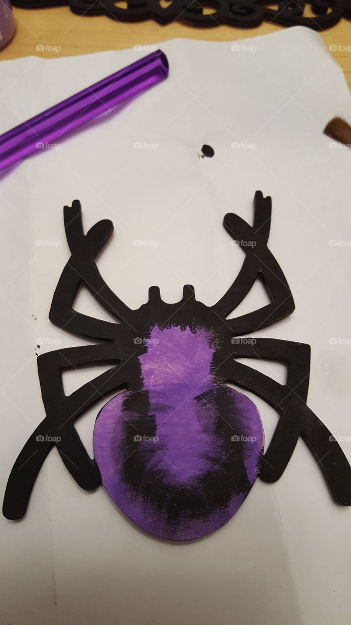 painting a pretty purple spider for my sister to hang on her Welcome sign using my purple paintbrush.