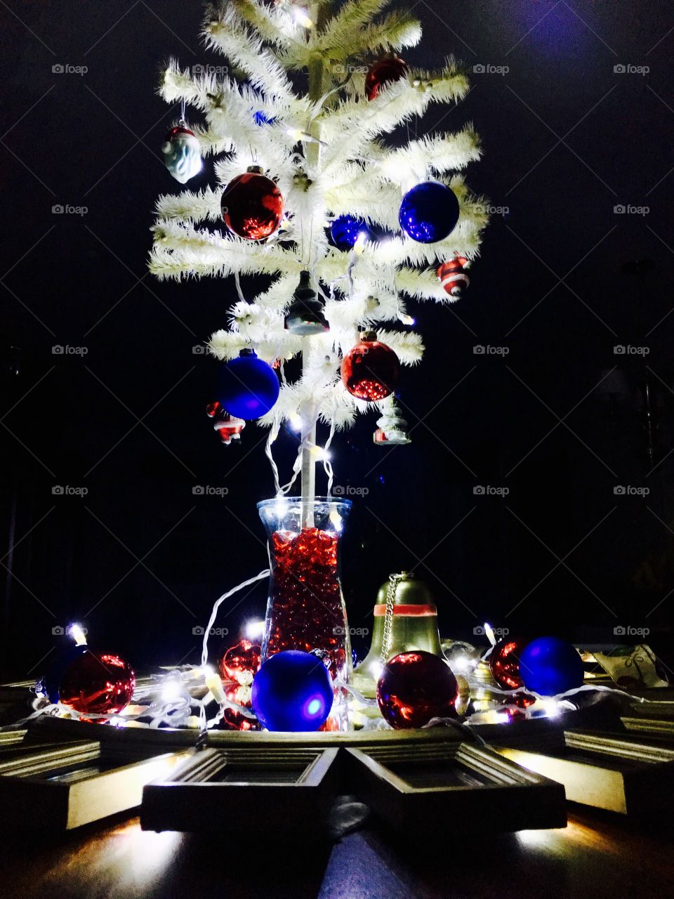 White Christmas Tree with red and blue ornaments 