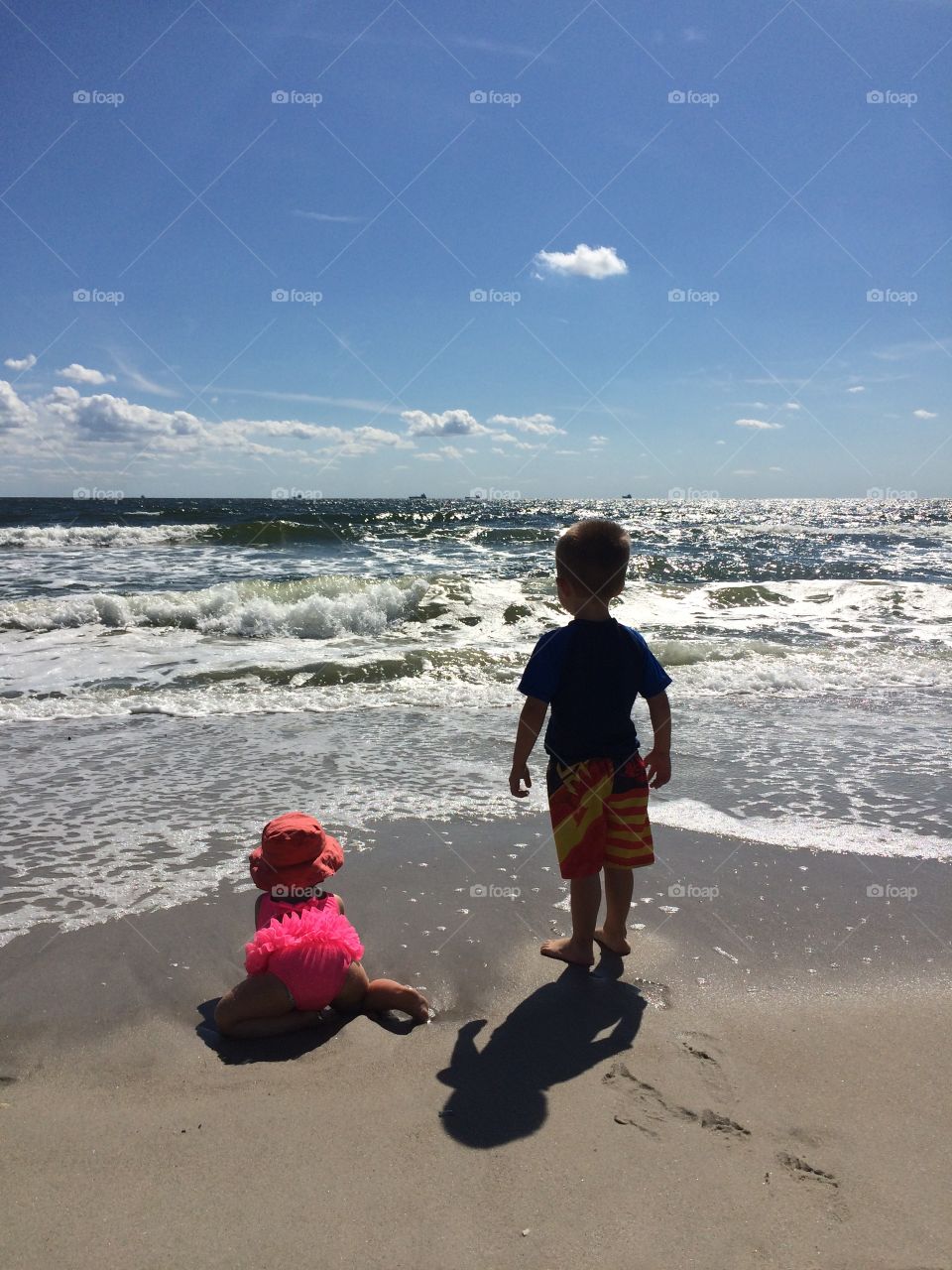 Kids by the ocean 