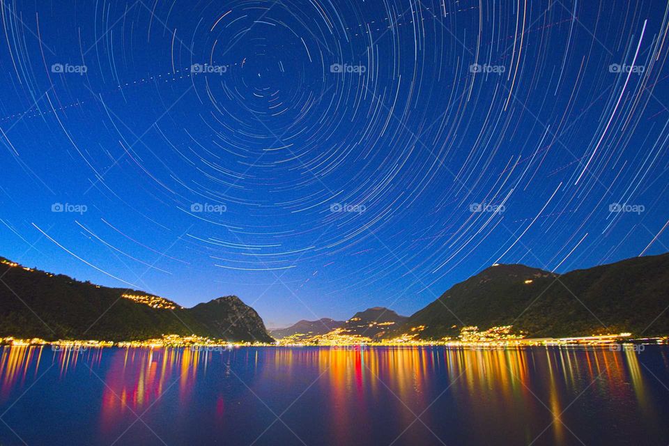 Star circles above Lugano and its lake.