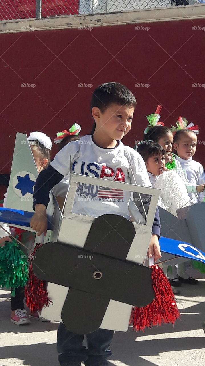 A day at my son's kindergarden celebrating Mexican Revolution but my son with a t-shirt of the US 😂 haha!