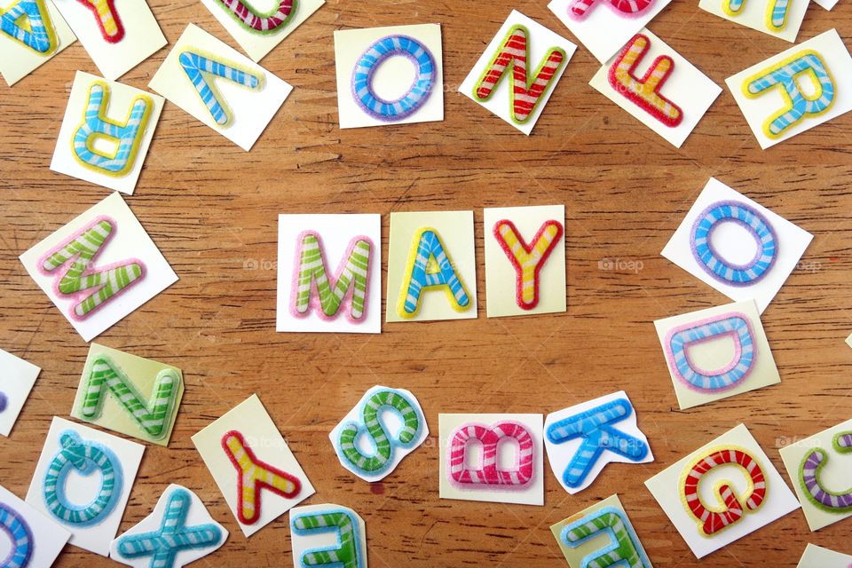 the word may. the word may spelled in colorful letters