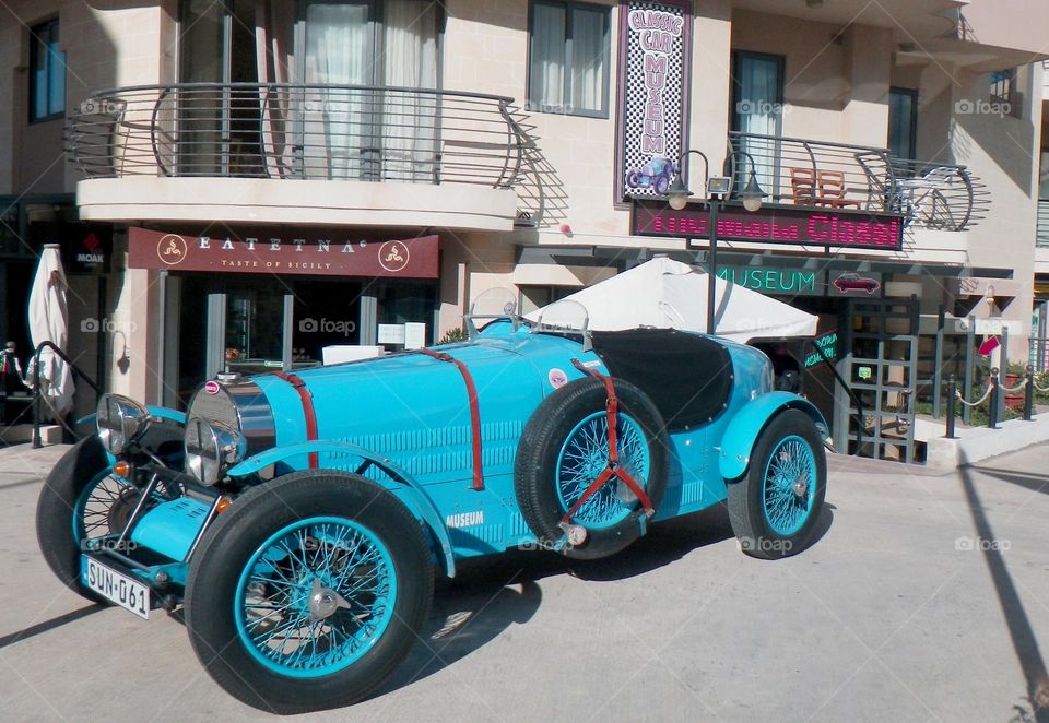 Vintage blue car at the street